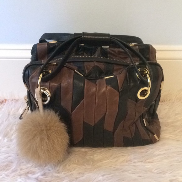 Juicy Couture Handbags - Juicy Couture Duffle Style Leather Purse w/Pom